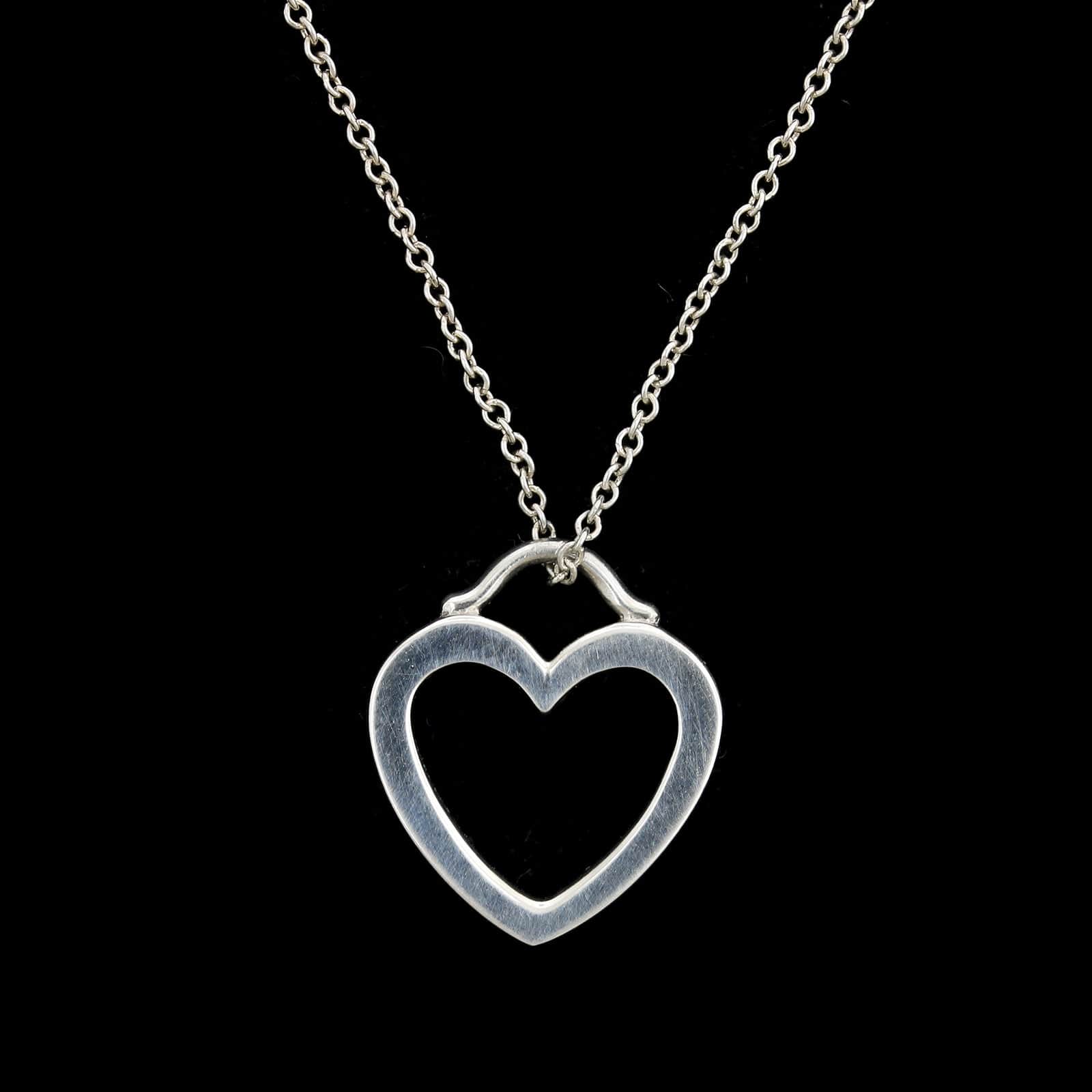 Tiffany and co hot sale silver heart pendant