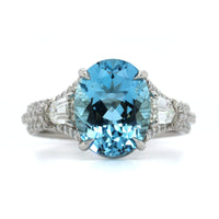 Platinum Oval Aquamarine and Diamond Ring