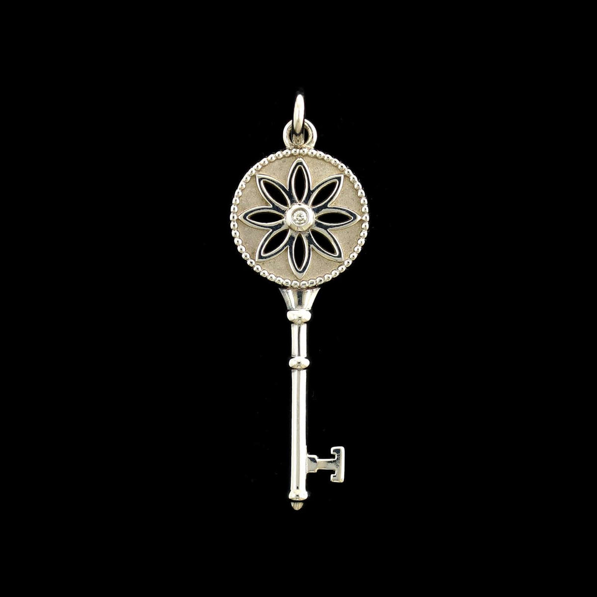 Tiffany & Co. Sterling Silver Estate Diamond Daisy Key Charm