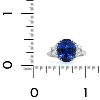 Platinum Sapphire and Trapezoid Diamond 3 Stone Ring