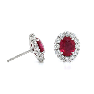 Platinum Oval Ruby and Diamond Halo Stud Earrings